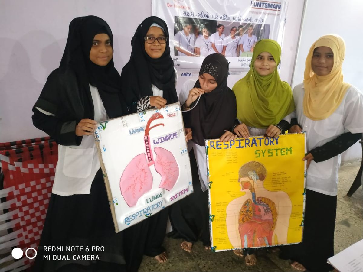 Paramedical students presenting science charts